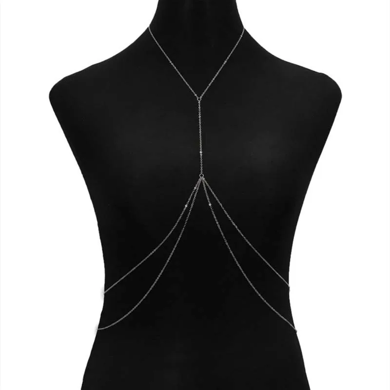 Silver version of the double-layer chest chain styled with a white bikini