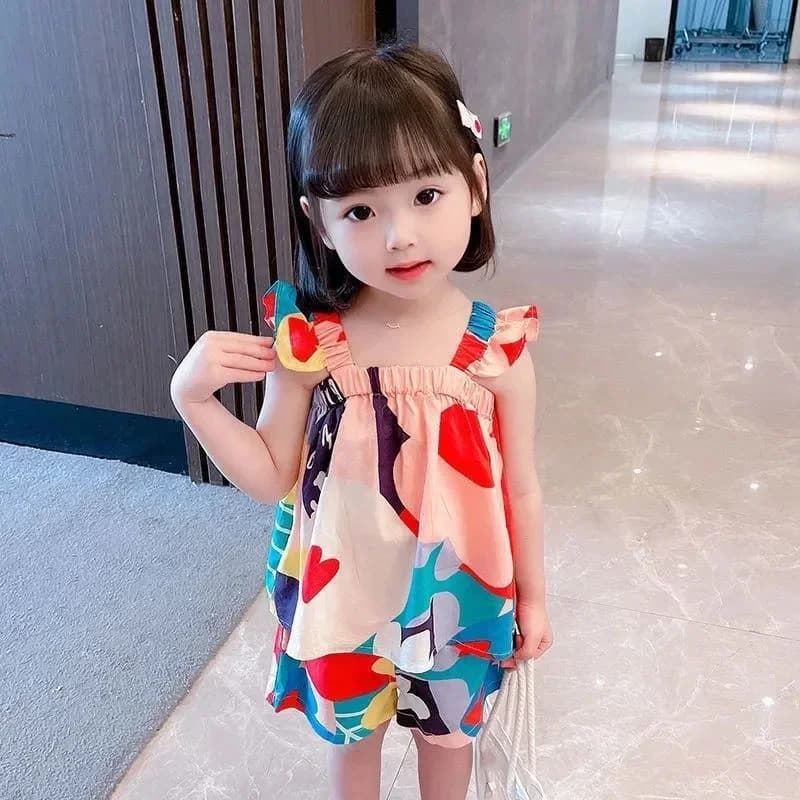 Front view of the baby girl floral suspender set