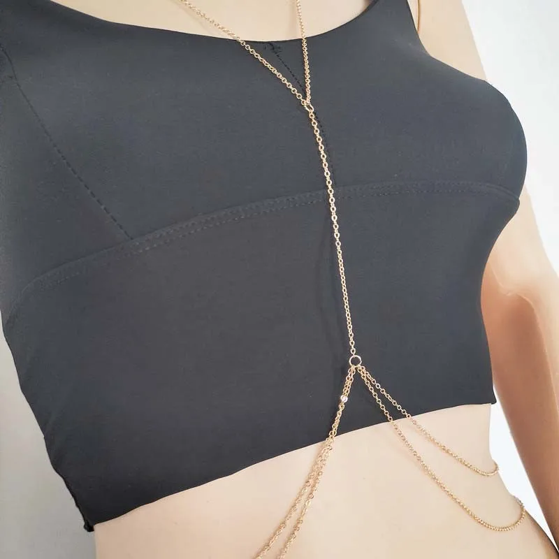 The chest chain styled on a model with beachwear
