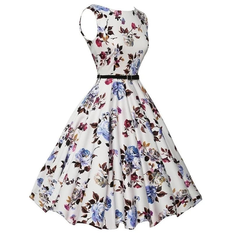 Close-up of the floral print on the retro swing dress showing the vibrant pink and floral pattern