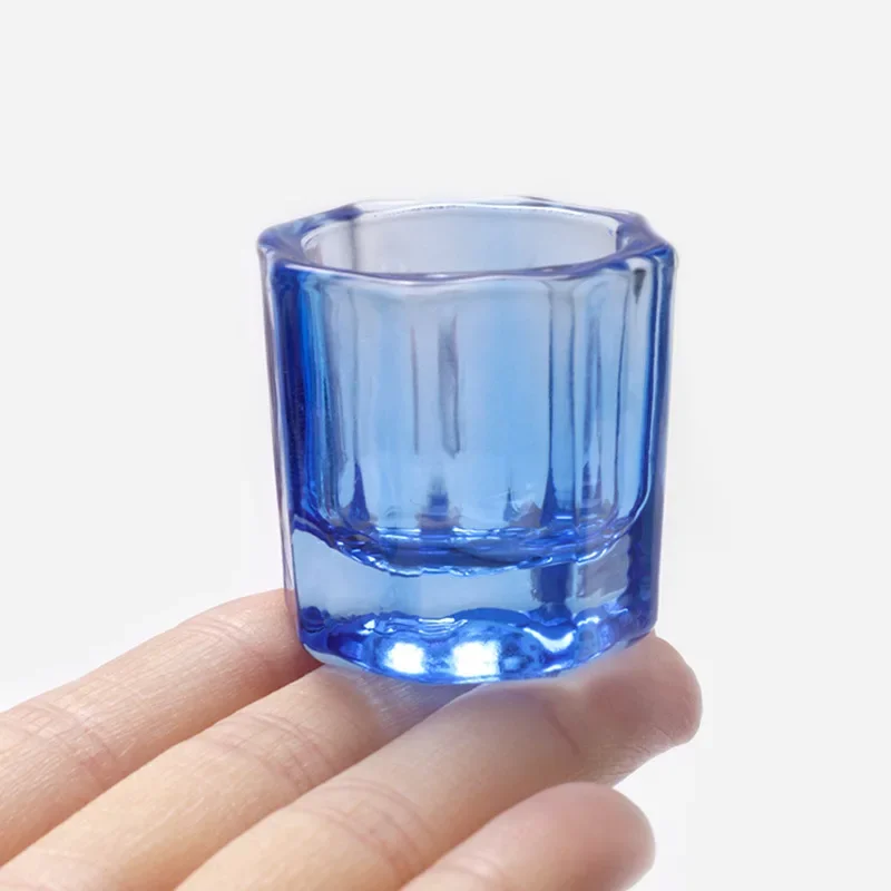 Close-up of crystal glass dappen dish with coloured glass options