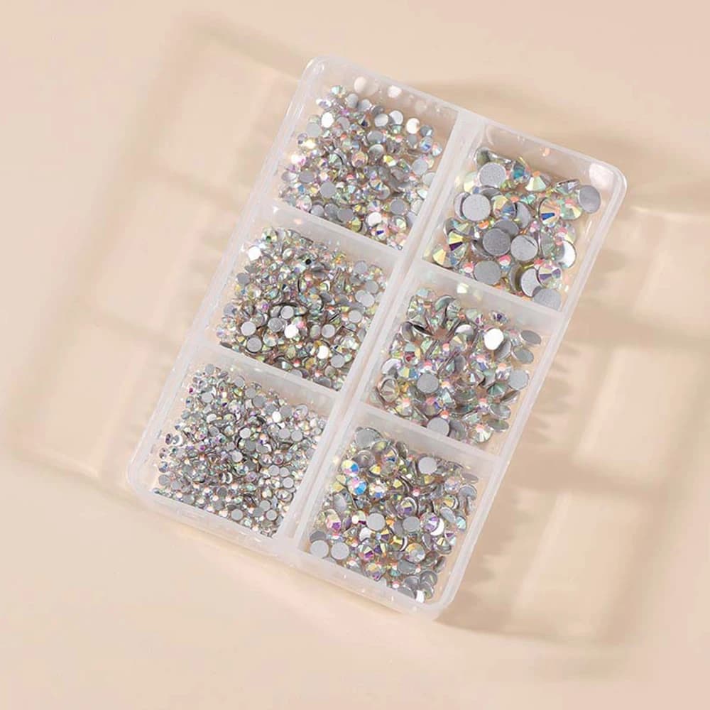 Box of multi-size AB crystal nail rhinestones for a French manicure