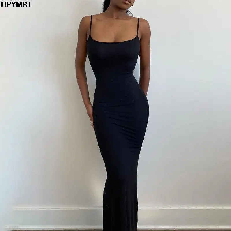 Satin slip dress worn at a garden party